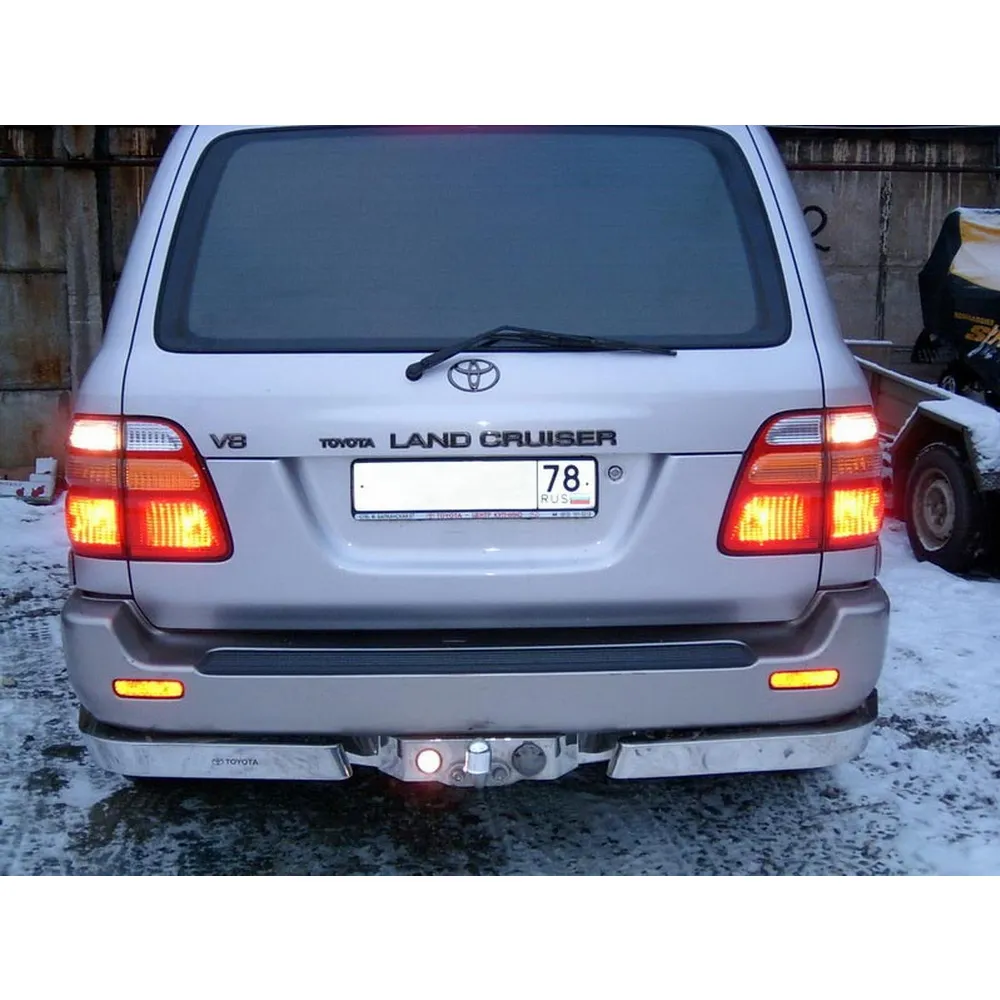 Фаркоп TOYOTA LAND CRUISER 100 VX, 98-07, шар F нержавеющий, 100/2500, с нержавеющей накладкой и фонарем
