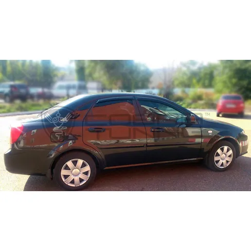 Дефлектора на окна Daewoo Gentra Sd 2013 деф.окон Cobra Tuning D10613