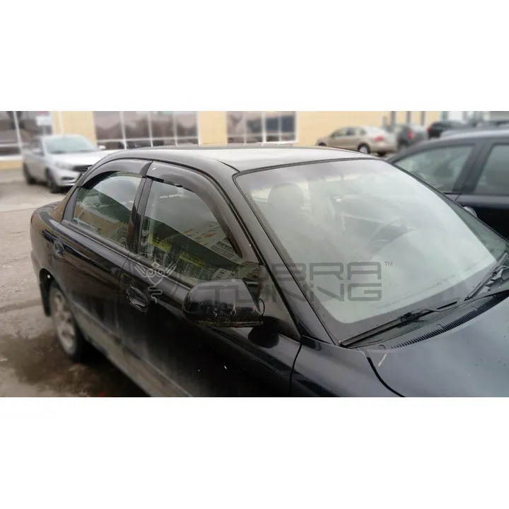 Дефлектора окон Kia Spectra Sd 2005 деф.окон Cobra tuning K11405